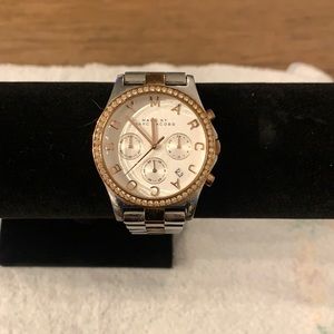 Woman’s stainless steel/ rose gold watch by Marc Jacob’s  size is 8 inches
